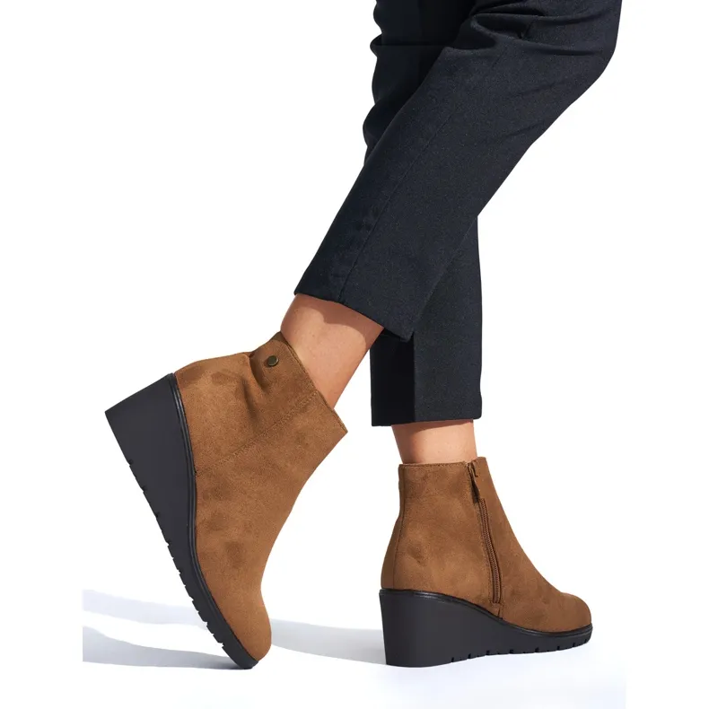 Brown wedge boots