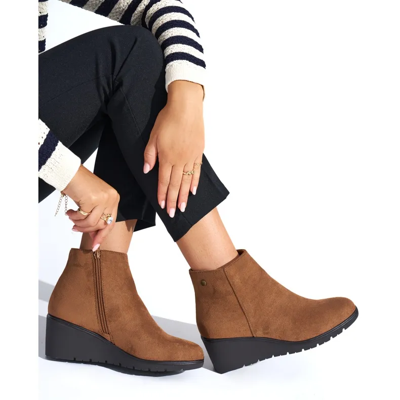 Brown wedge boots