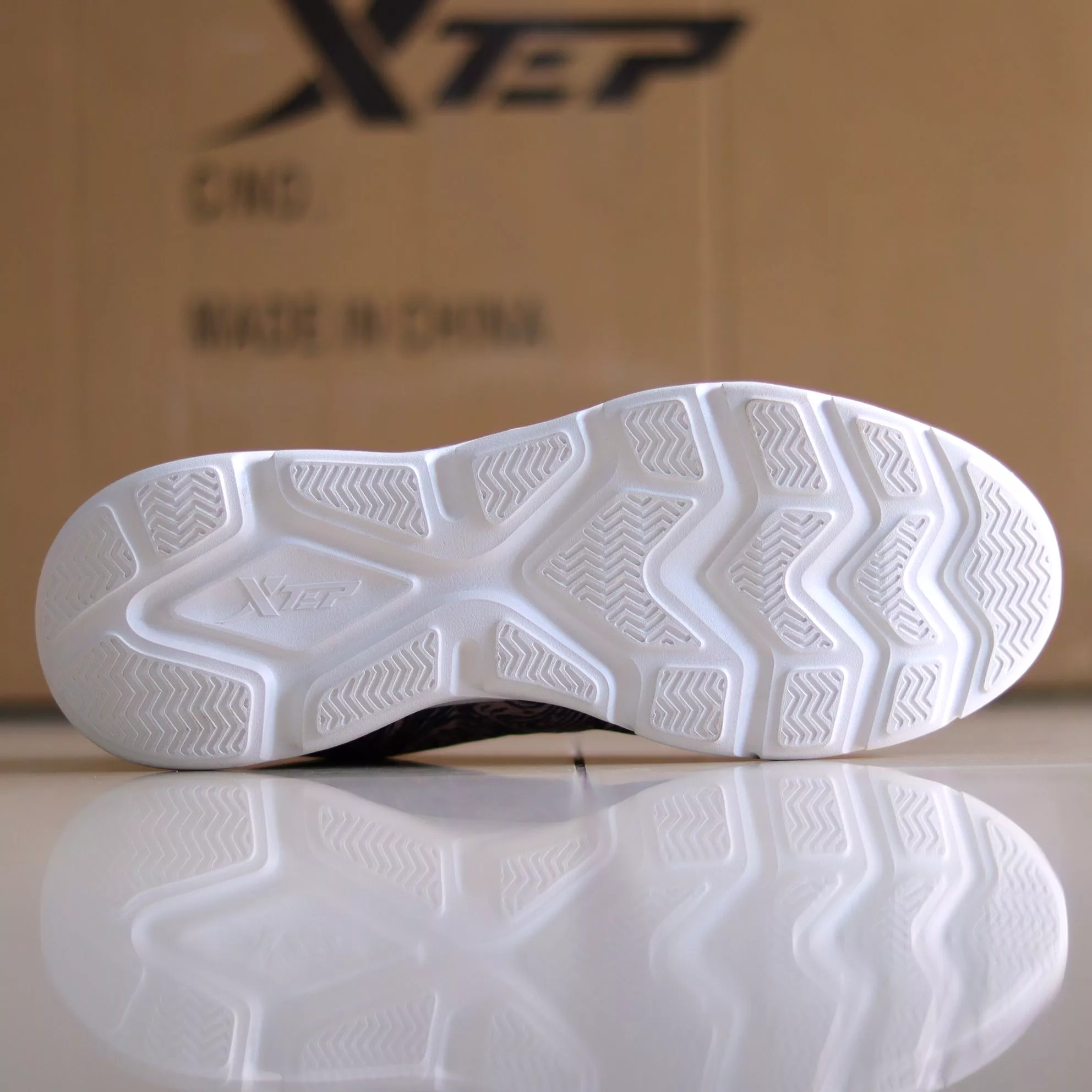 X31 - Women's Medicated Running Shoe by Xtep