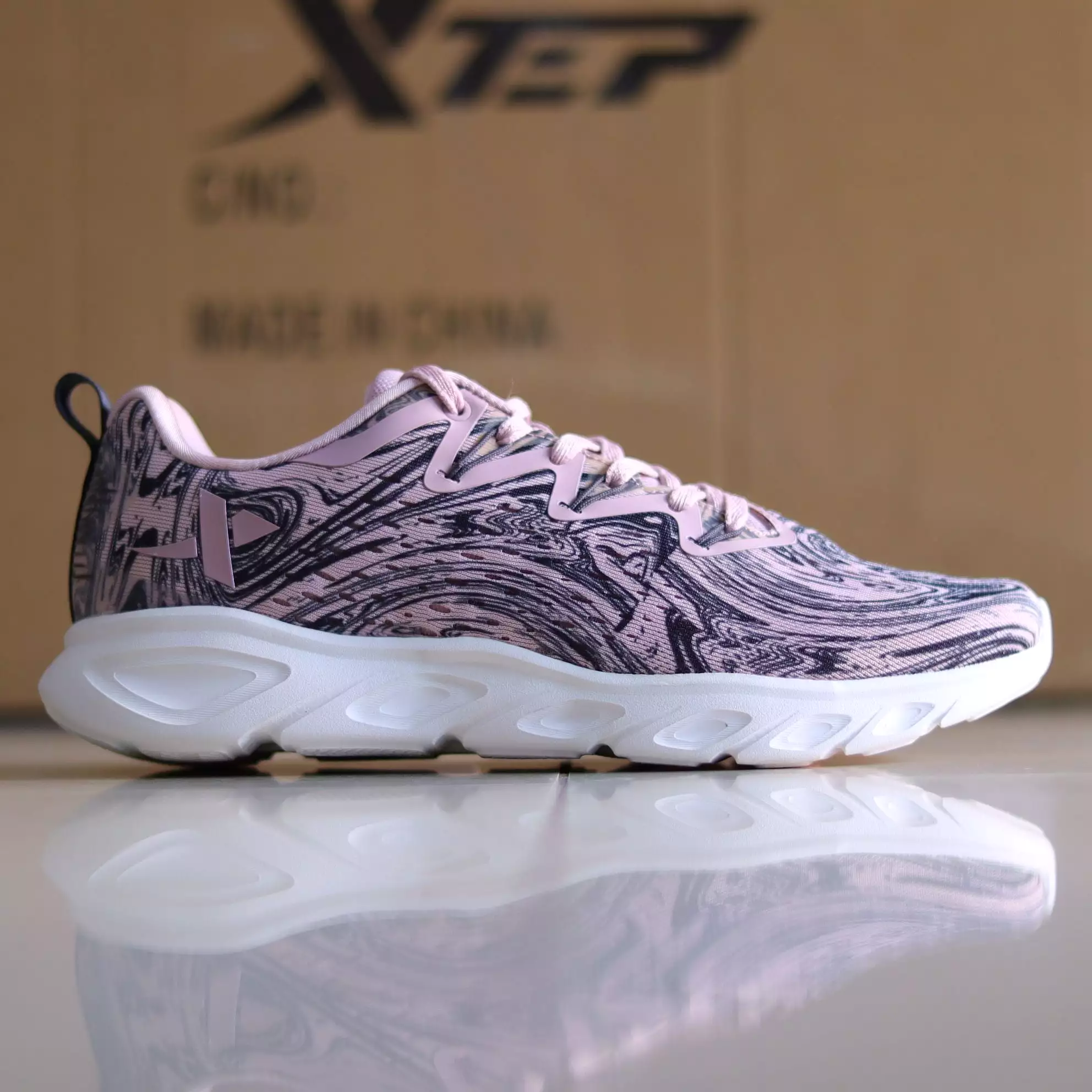 X31 - Women's Medicated Running Shoe by Xtep